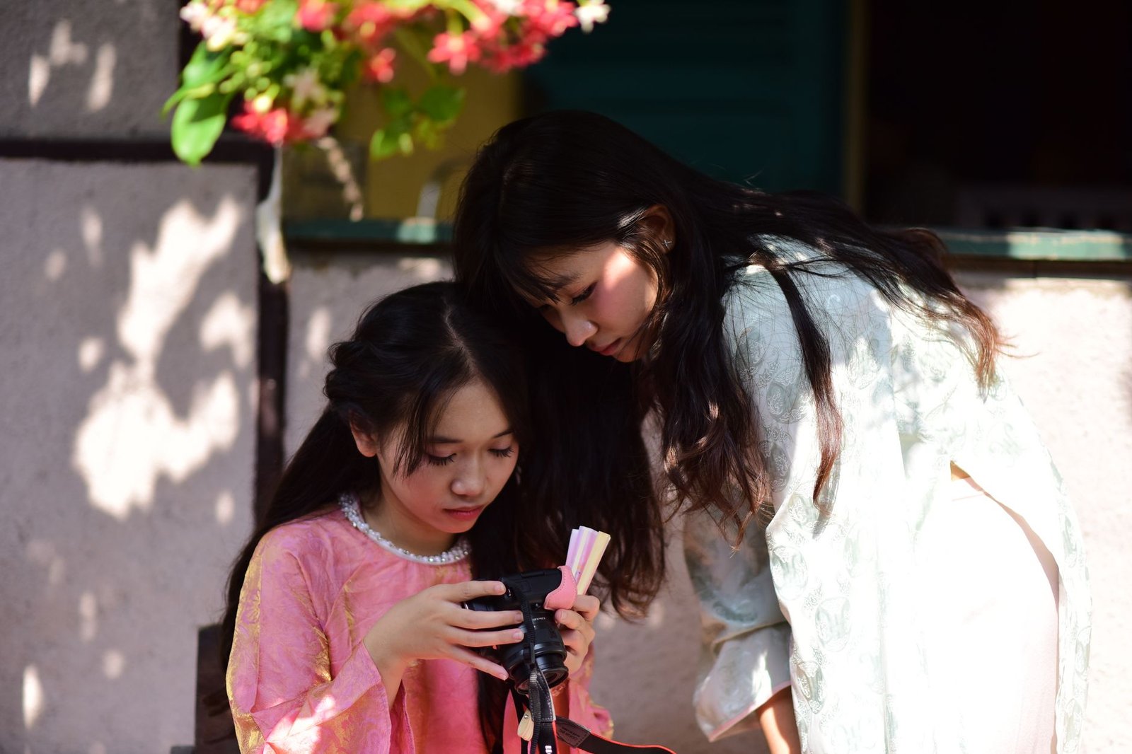 Mother and daughter smiling for a photo on Mother's Day